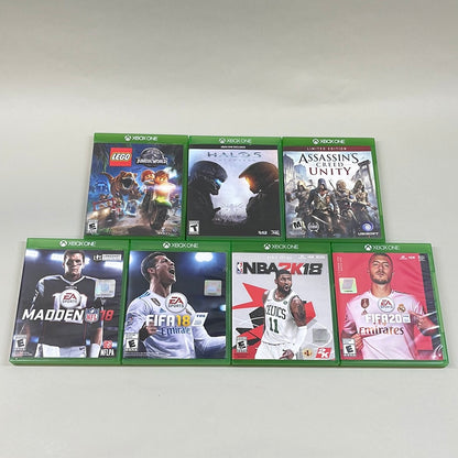 Lot of 7 Xbox One Games Assassins Creed Unity, Halo 5 Guardians, Fifa 20