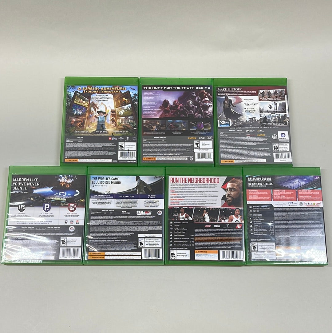 Lot of 7 Xbox One Games Assassins Creed Unity, Halo 5 Guardians, Fifa 20